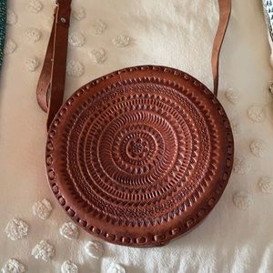 Hand stamped circular leather bag
